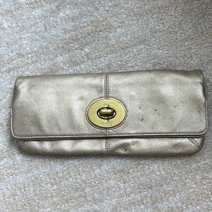 Gold Coach clutch
